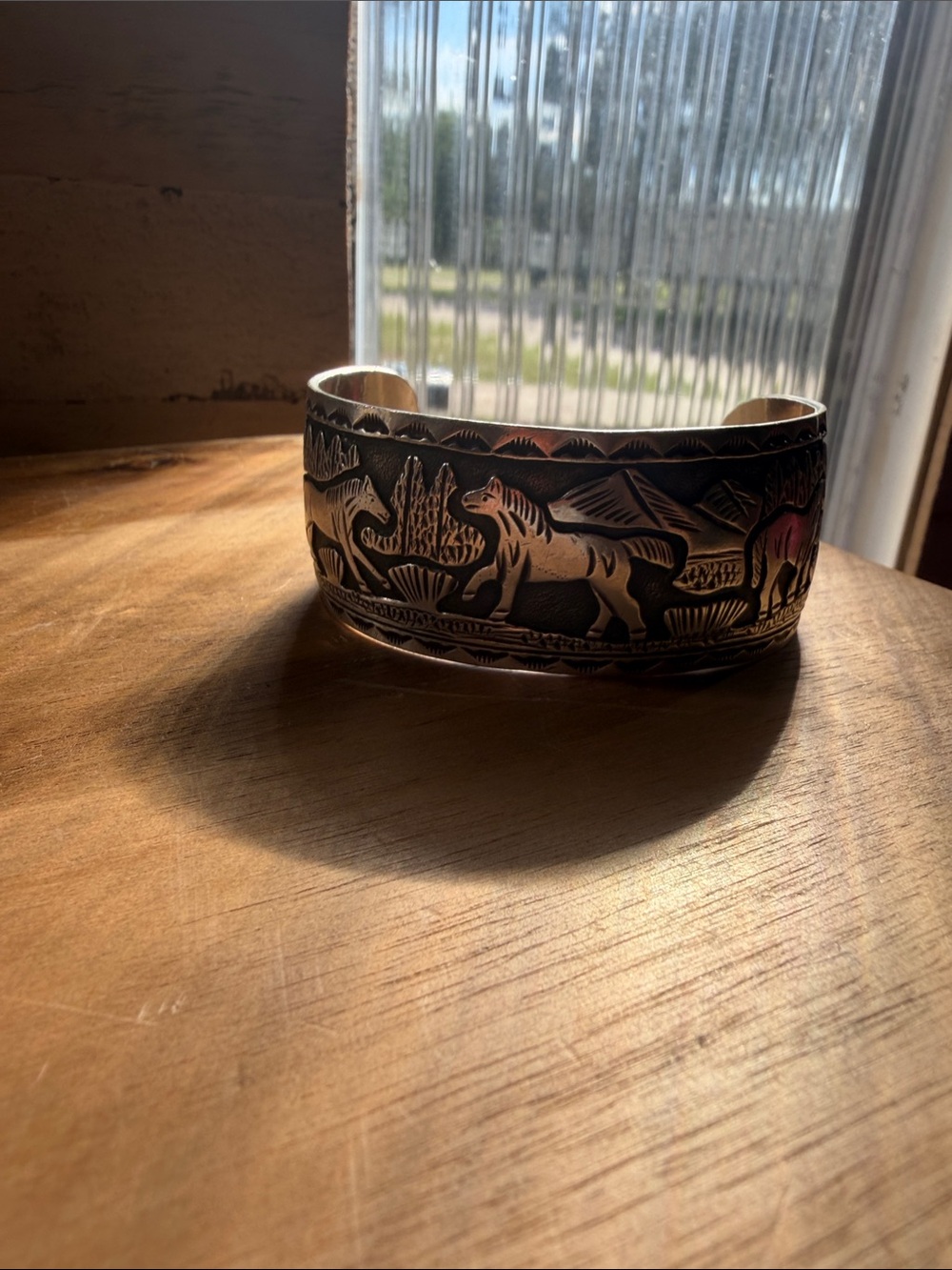 handcrafted Native American Navajo sterling silver storyteller cuff bracelet